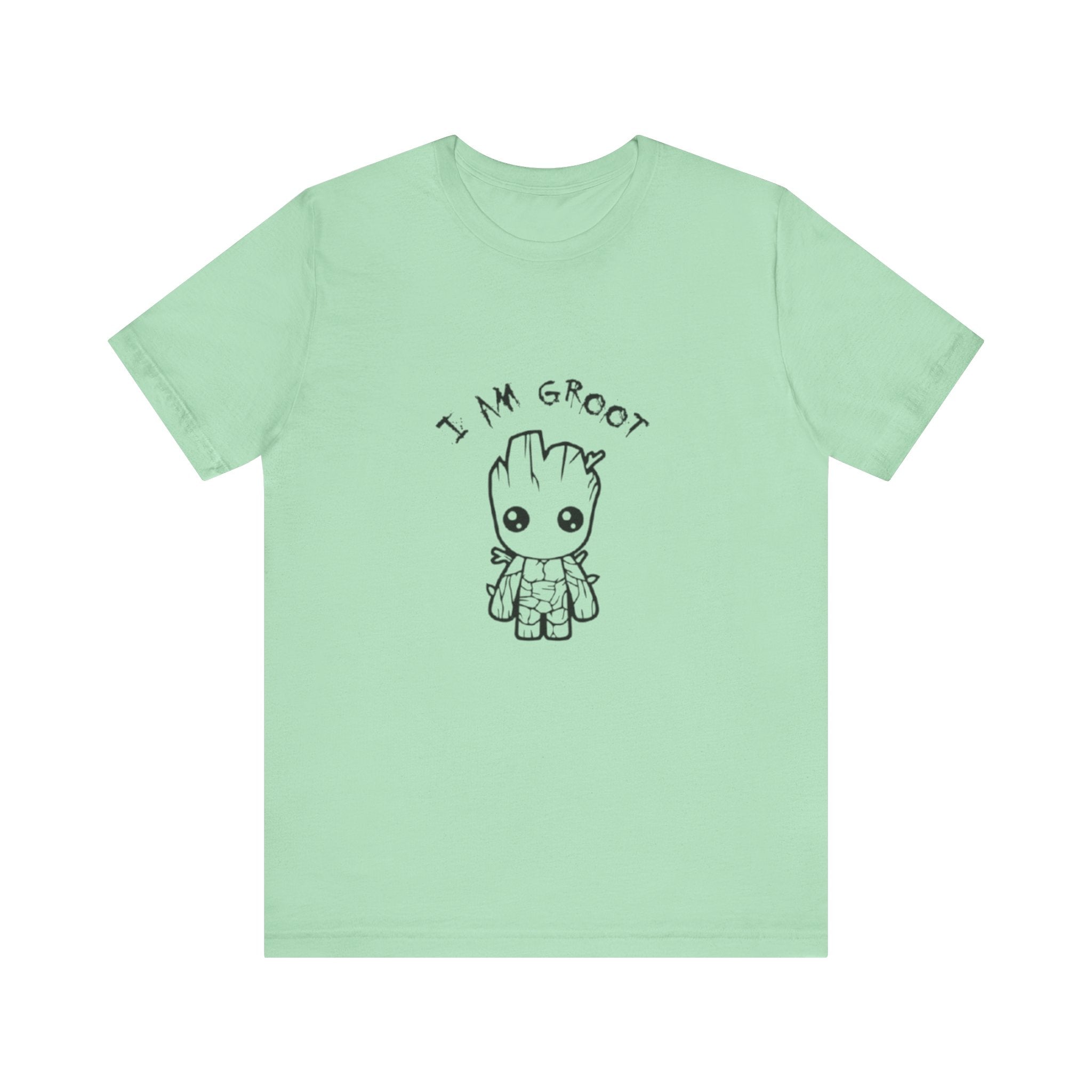 Light green t-shirt with 'I AM GROOT' text and cartoon character on a white background