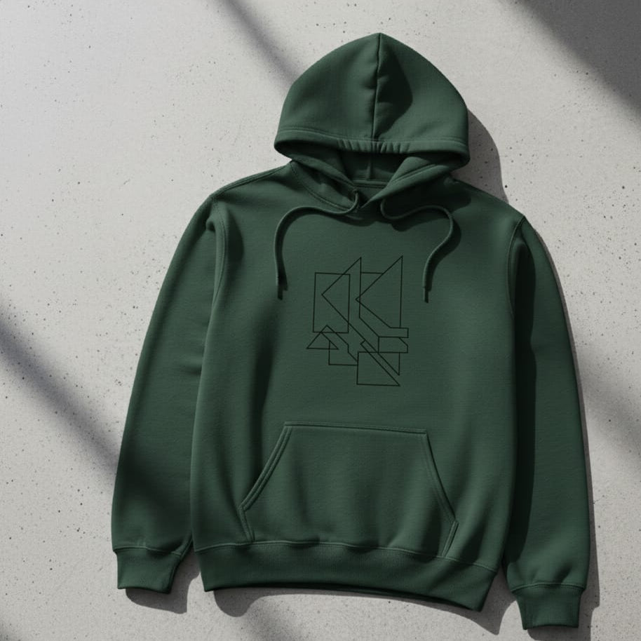 Green hoodie with geometric design on a gray surface