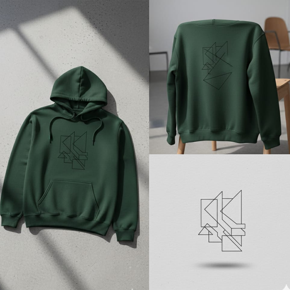 Green hoodie with geometric design on a gray surface and chair.