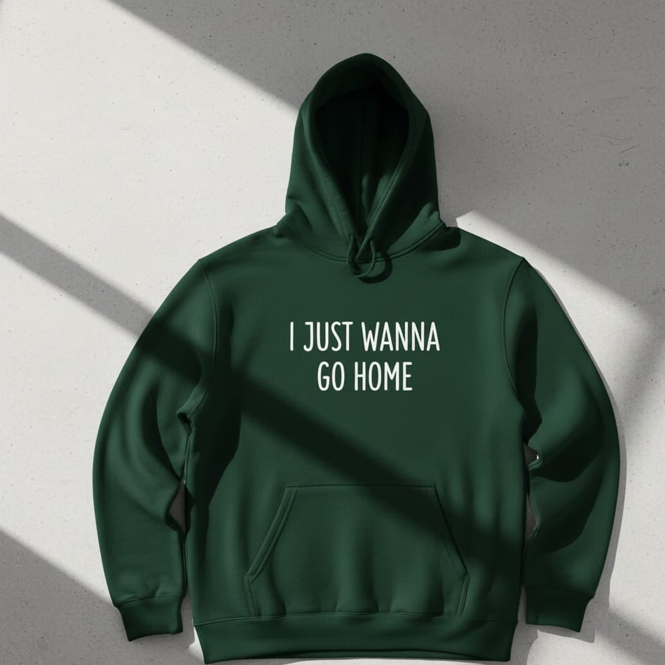 Green hoodie with 'I JUST WANNA GO HOME' text on a gray background