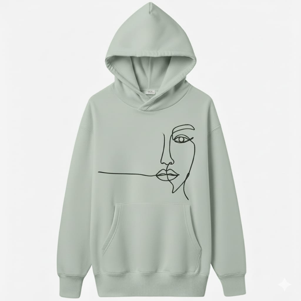 Light green hoodie with a face design on a white background